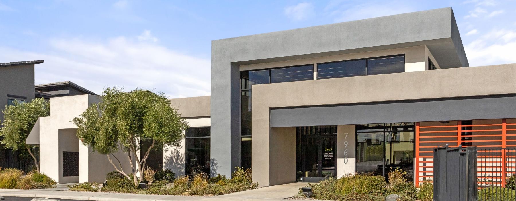 a building with a parking lot